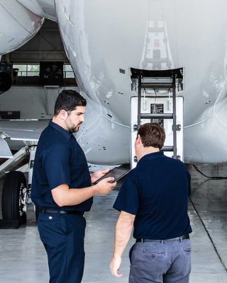Director of Maintenance Inspecting Rear of G650