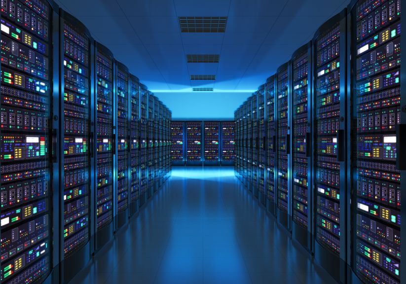 Modern web network and internet telecommunication technology, big data storage and cloud computing computer service business concept: server room interior in datacenter in blue light
