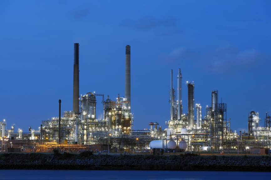 Chemical Plant Illuminated at Dusk in Netherlands